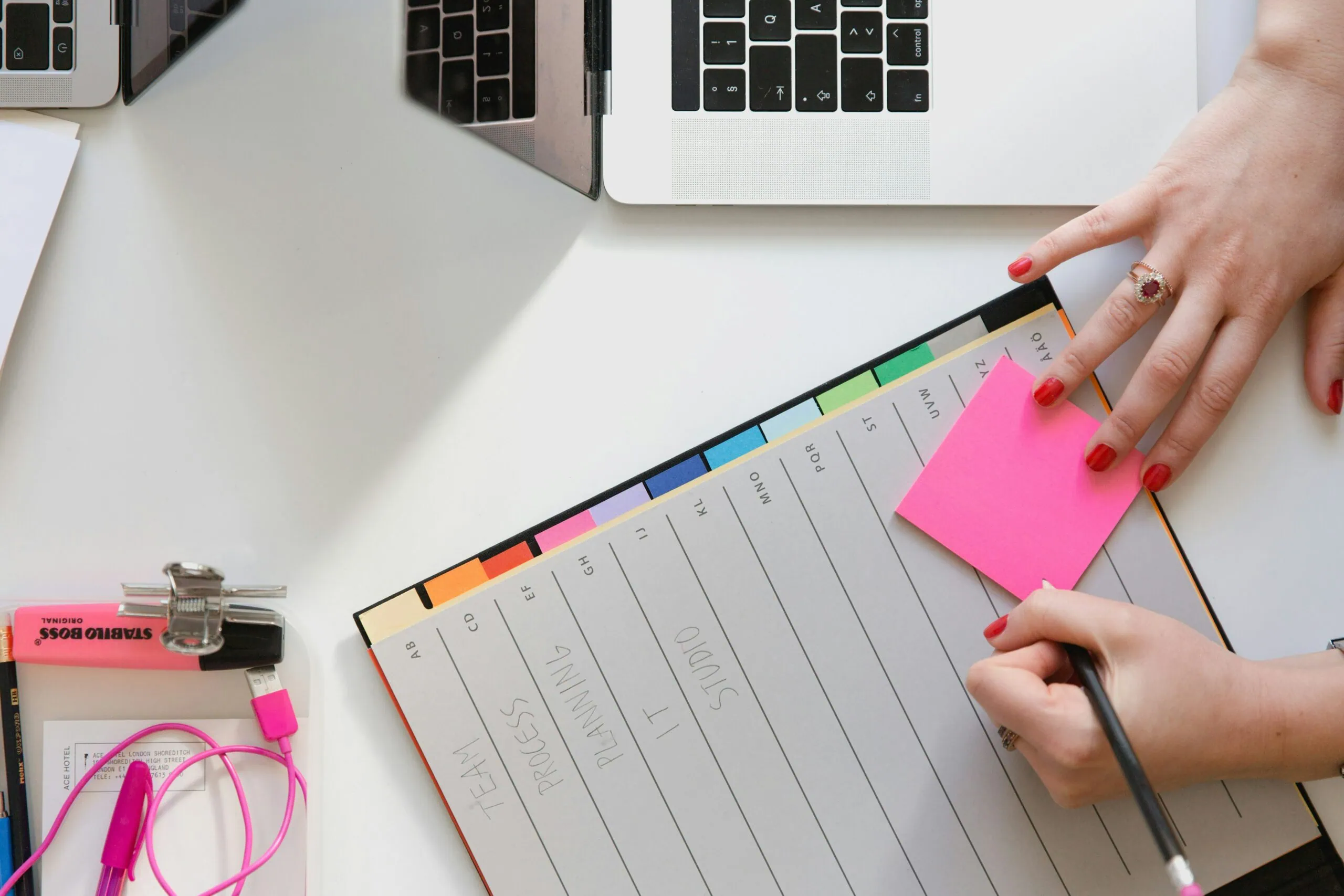 Planner on desktop. Photo by Marten Bjork on Unsplash